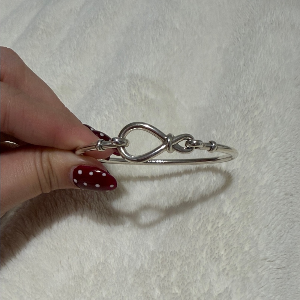 Pandora Silver Infinity Knot Bangle with Red Nail Accent